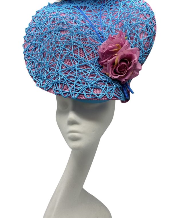 Showstopper headpiece in baby pink and baby blue.